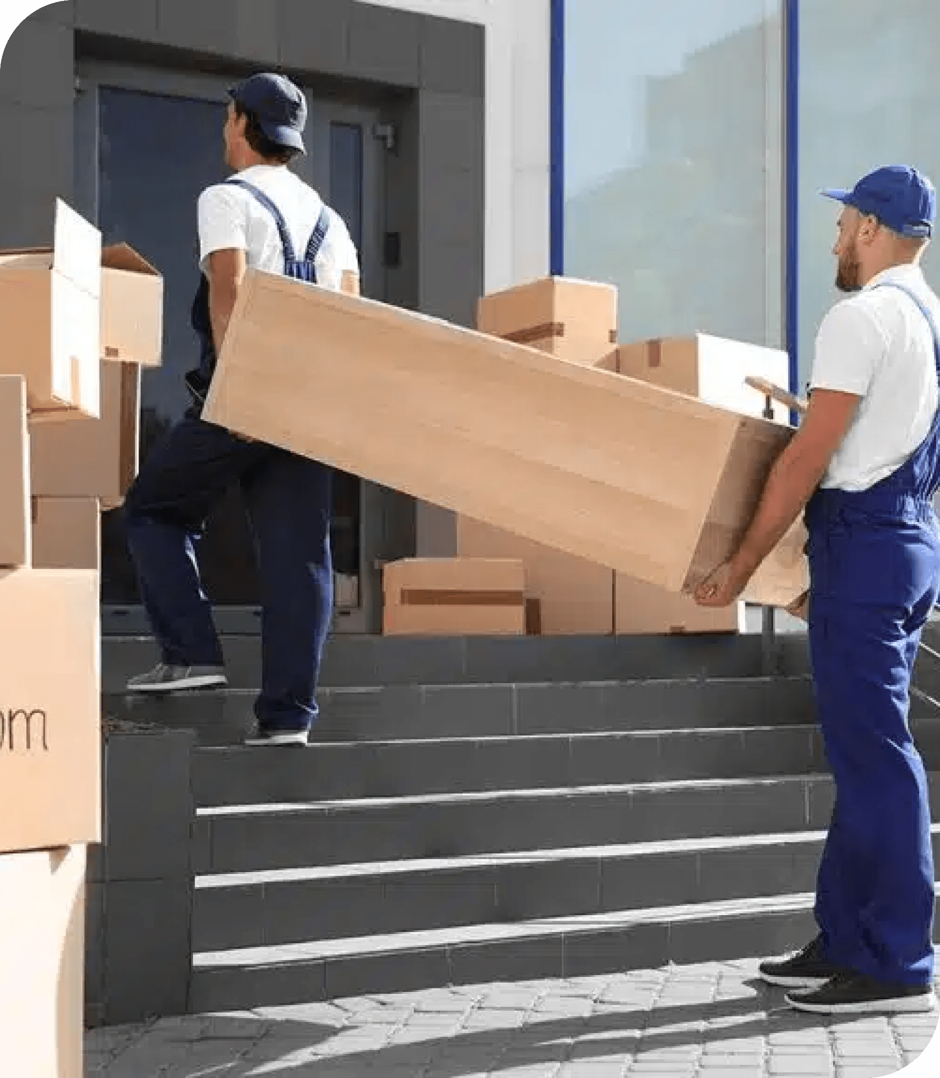 Movers carrying boxes